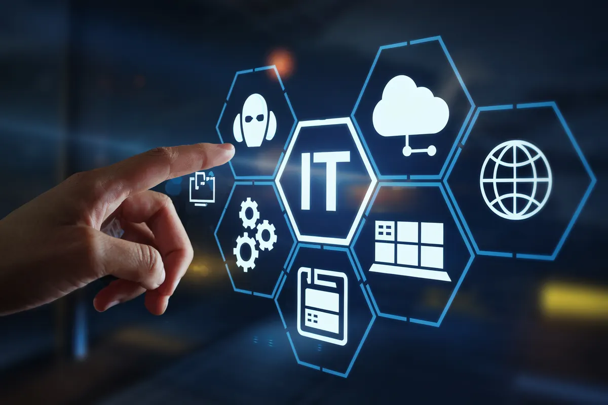 A hand reaching toward a ring of hexagons labeled IT, with cloud, web and device icons